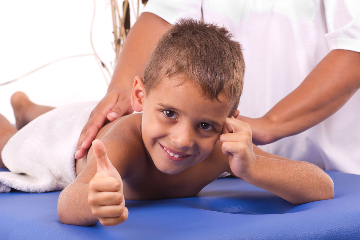 child getting a back massage
